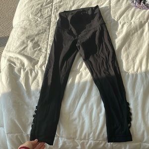 Lululemon high waisted capris size 4 with mesh on leg and super cool X design
